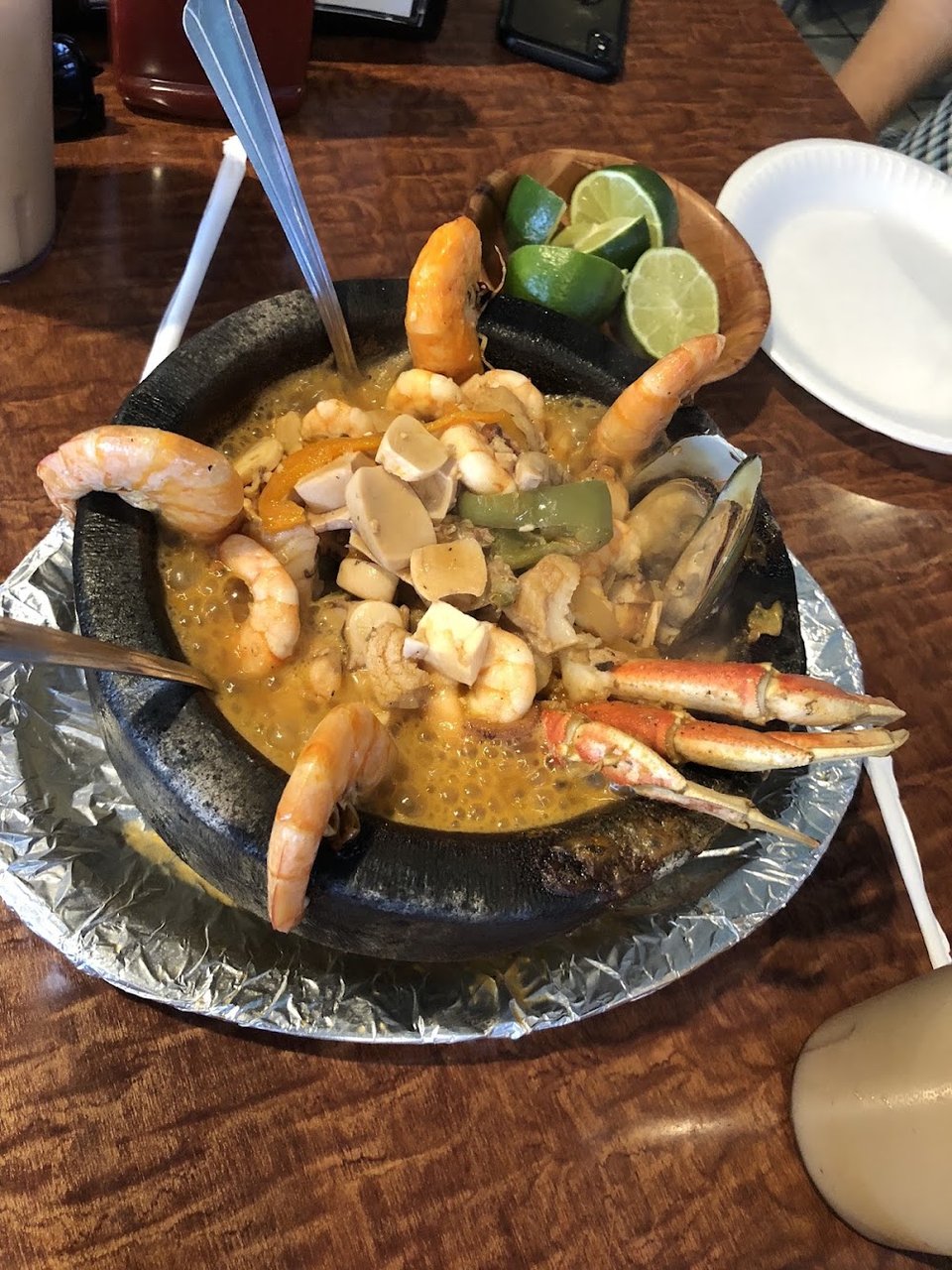 Menu page showing shrimp dishes and fish plates.