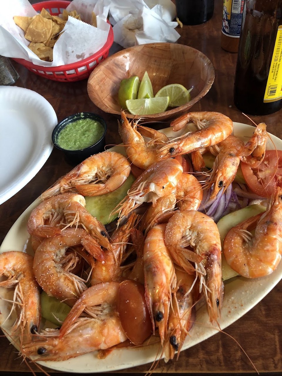 Mexican menu with drinks, plates, and shrimp options.